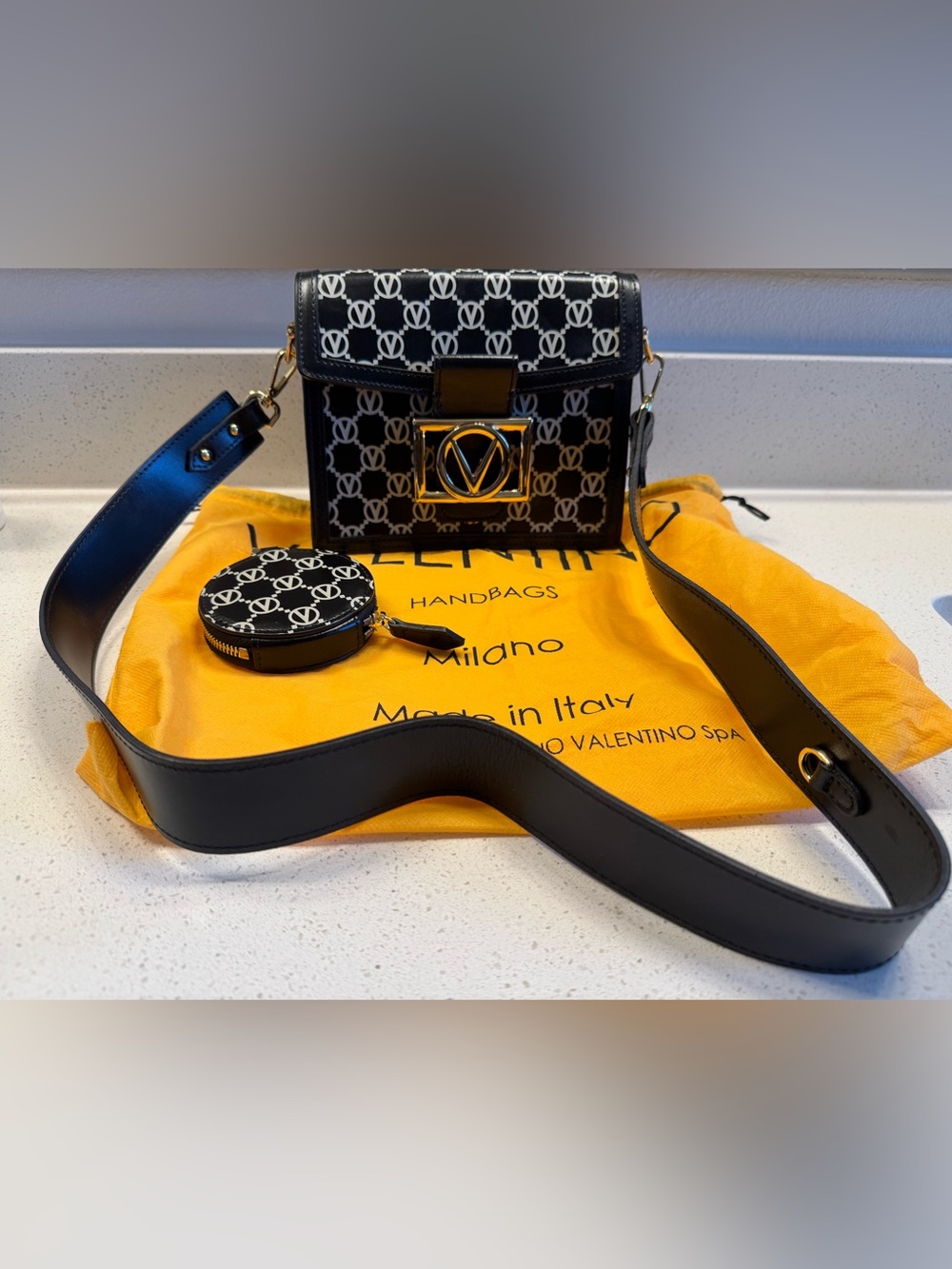 Valentino Black and White Logo Crossbody with Gold V Emblem